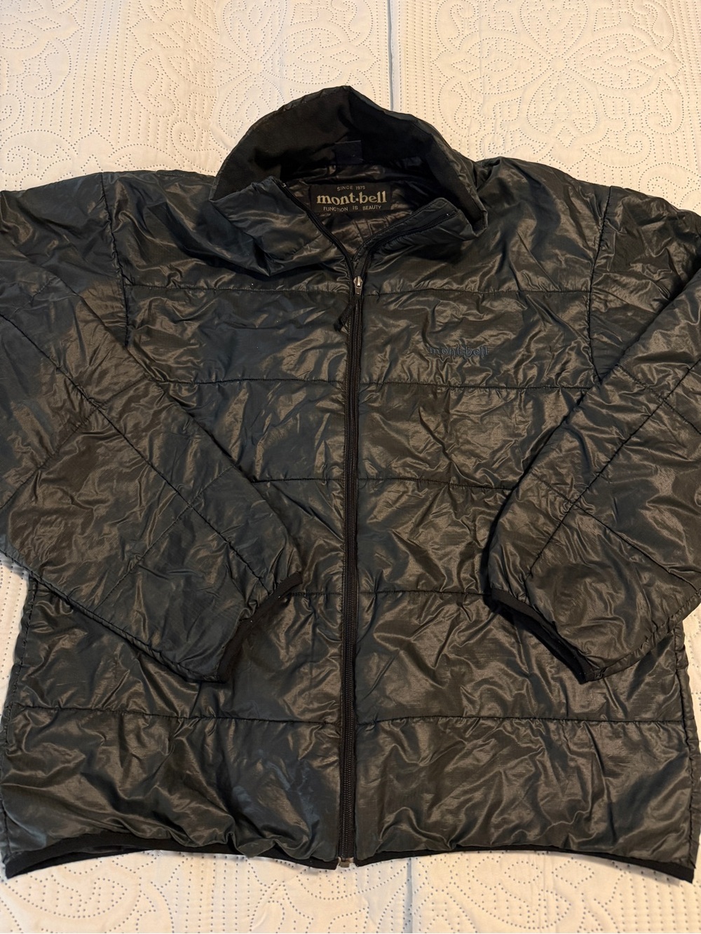 Vintage Montbell men’s Ultra Light insulated jacket small green black
